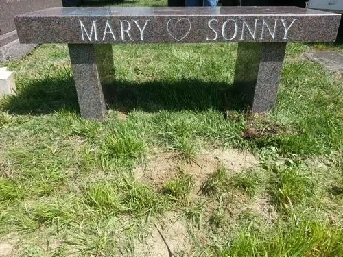 Gray granite memorial bench